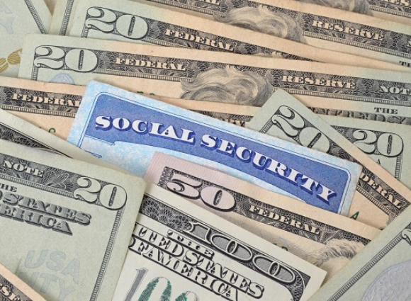 Social Security Card Amongst Money