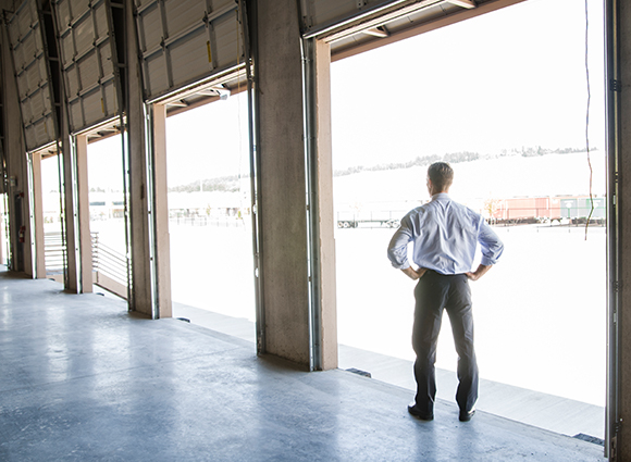 Man Standing In Loading Dock