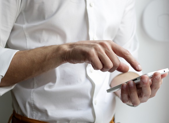 Businessman Holding Phone