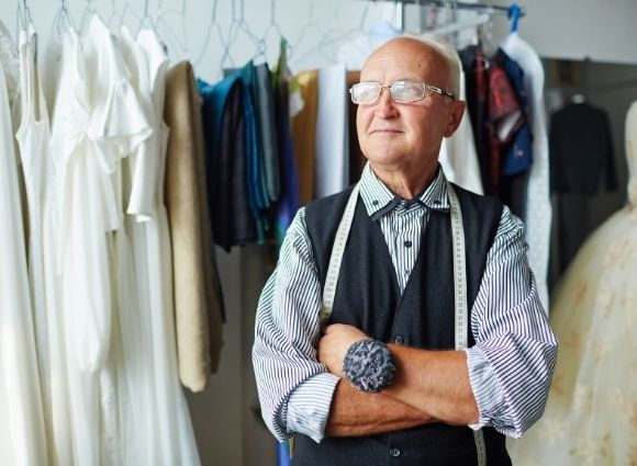 Small Business Older Man In Dry Cleaning Store
