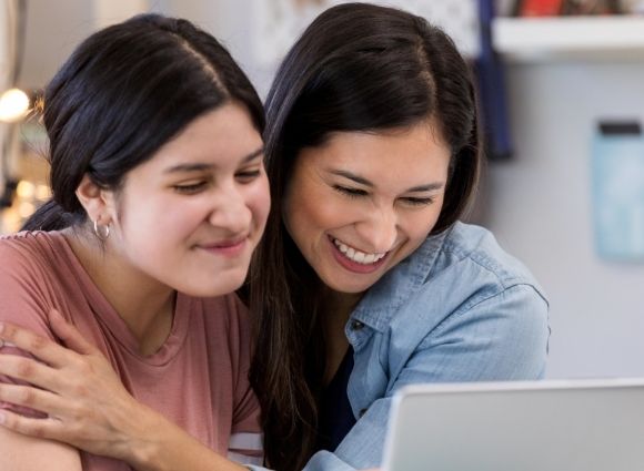 Mom Happy For Child At Computer