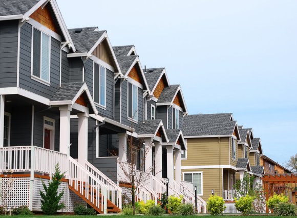 Photo Of Dark Grey House Condos Lined Up In A Row