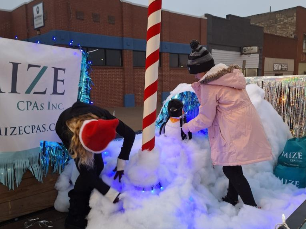 Children Decorating The Igloo On The North Pole Float